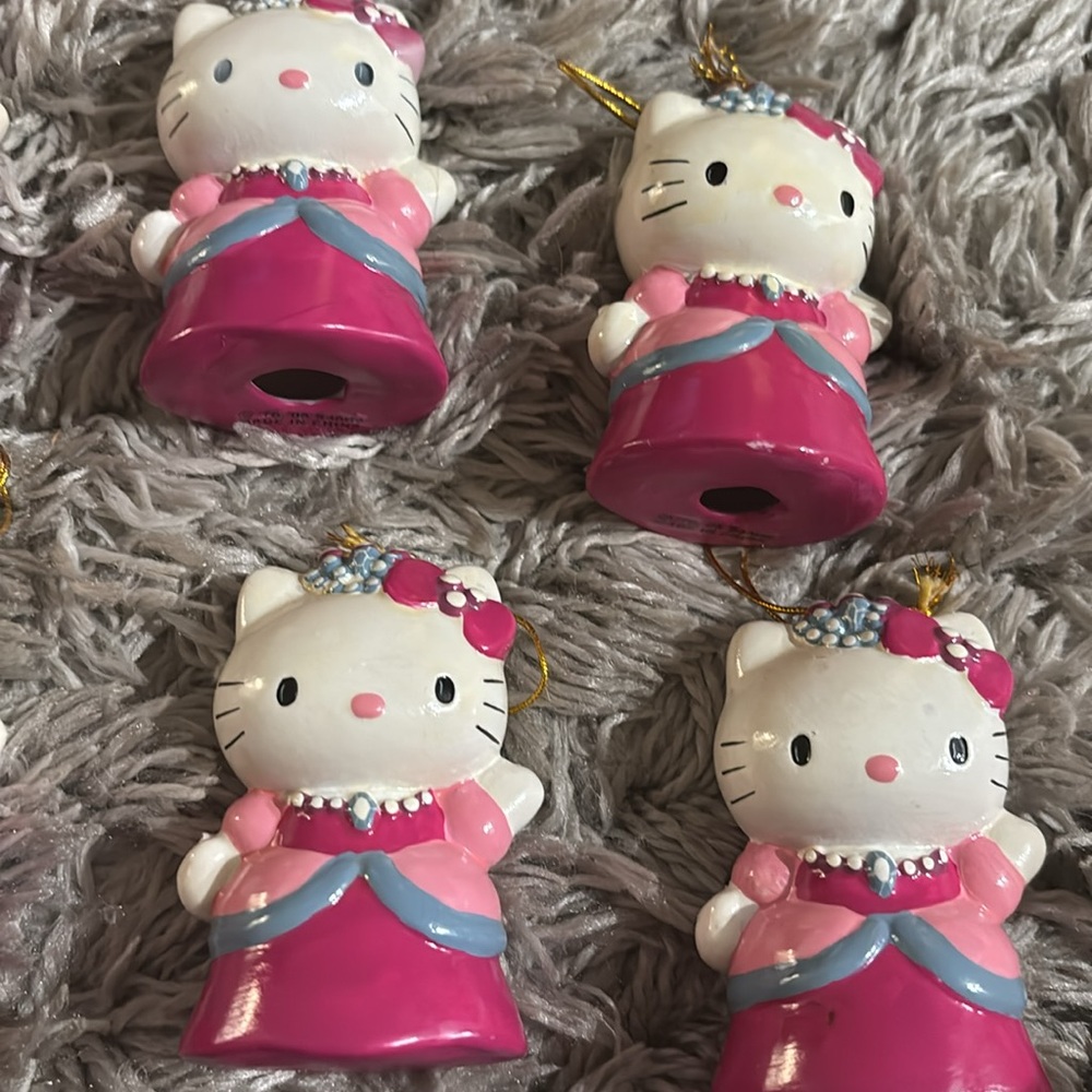 Lot of 25 Vintage Pink Hello Kitty ceramic ornaments.
